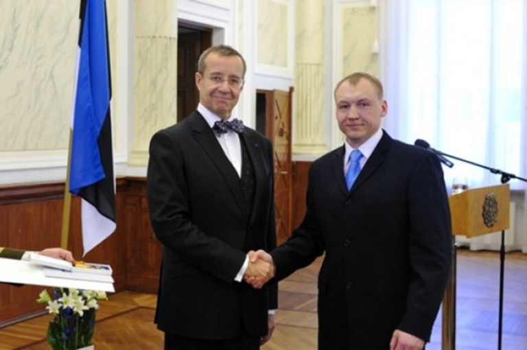 File-In this Feb. 23, 2010, file photo provided by the  Office of the Estonian President,  Estonian security service officer Eston Kohver, right,  receives decoration from the Estonian President Toomas Hendrik Ilves, left. On Sept. 5, 2014 Estonia said Kohver was abducted by unknown gunmen on its territory and taken across the border to Russia. Russian Federal Security Service said the man was detained on its territory and suspected of being a spy. (AP Photo/Office of the Estonian President, File)