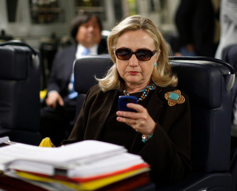 PhilippeÂ Reines explained the smiley face situation in a way that would also give Hillary Clinton another chance to reprimand him for being late. (AP Photo)