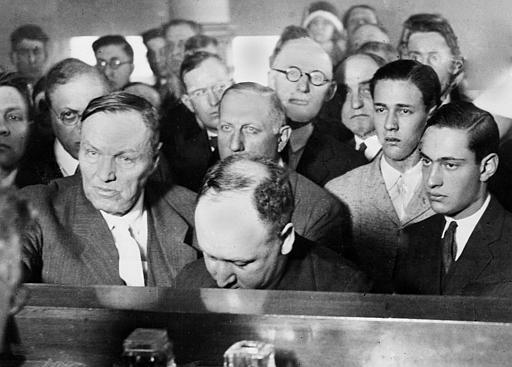 Nathan Leopold, 19, far right, and Richard Loeb, 18, second from right, are seen during their arraignment in a Cook County courtroom with attorney Clarence Darrow, left, in July 1924.  The two teenagers were convicted and sentenced to serve life plus 99 years for the murder-kidnapping of Bobby Franks in May 1924. (Photo: AP file)