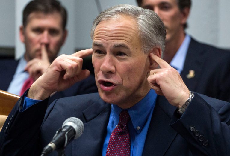 Texas Gov. Greg Abbott received praise Wednesday for following through on his promise to sue the federal government if Syrian refugees are resettled in his state. (AP Photo/Desmond Boylan)