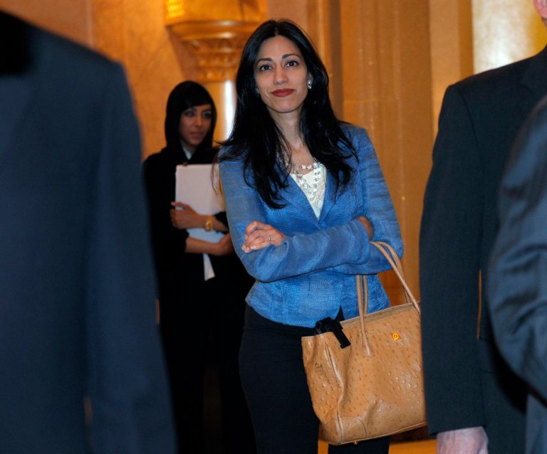 Huma Abedin, aide to Secretary of State Hillary Rodham Clinton, heads to a meeting at the Emirates Palace Hotel in Abu Dhabi, United Arab Emirates, Thursday, June 9, 2011. (AP Photo/Susan Walsh, Pool)