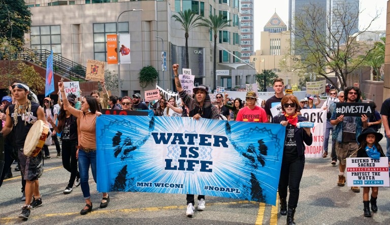 The lawsuit from the conservative watchdog group charges that the Obama administration and environmentalists worked 