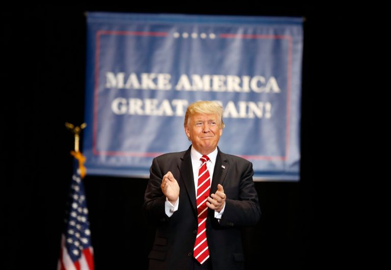 President Donald Trump arrives at a rally at the Phoenix Convention Center, Tuesday, Aug. 22, 2017, in Phoenix. (AP Photo/Alex Brandon)