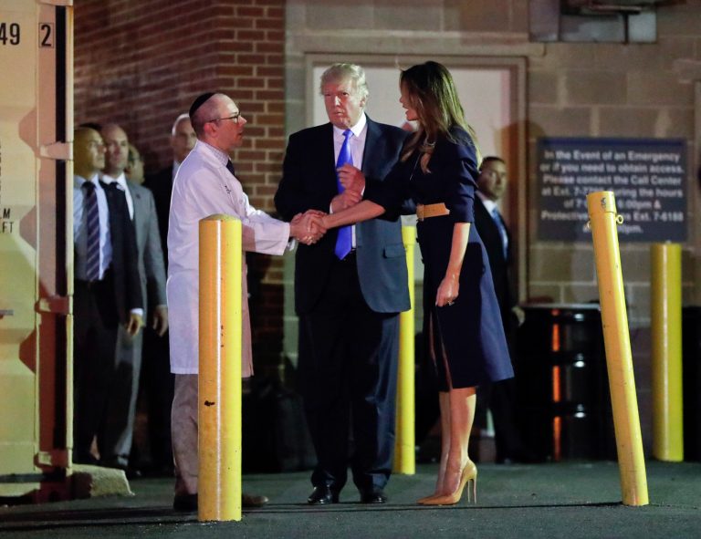 President Donald Trump and first lady Melania Trump with Dr. Ira Y. Rabin, left, after visiting MedStar Washington Hospital Center in Washington, Wednesday, June 14, 2017, where House Majority Leader Steve Scalise of La. was taken after being shot in Alexandria, Va., during a Republican congressional baseball practice. (AP Photo/Pablo Martinez Monsivais)