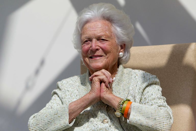 Former first lady Barbara Bush listens to a patient's question during a visit to the Barbara Bush Children's Hospital at Maine Medical Center in Portland, Maine, on Aug. 22.