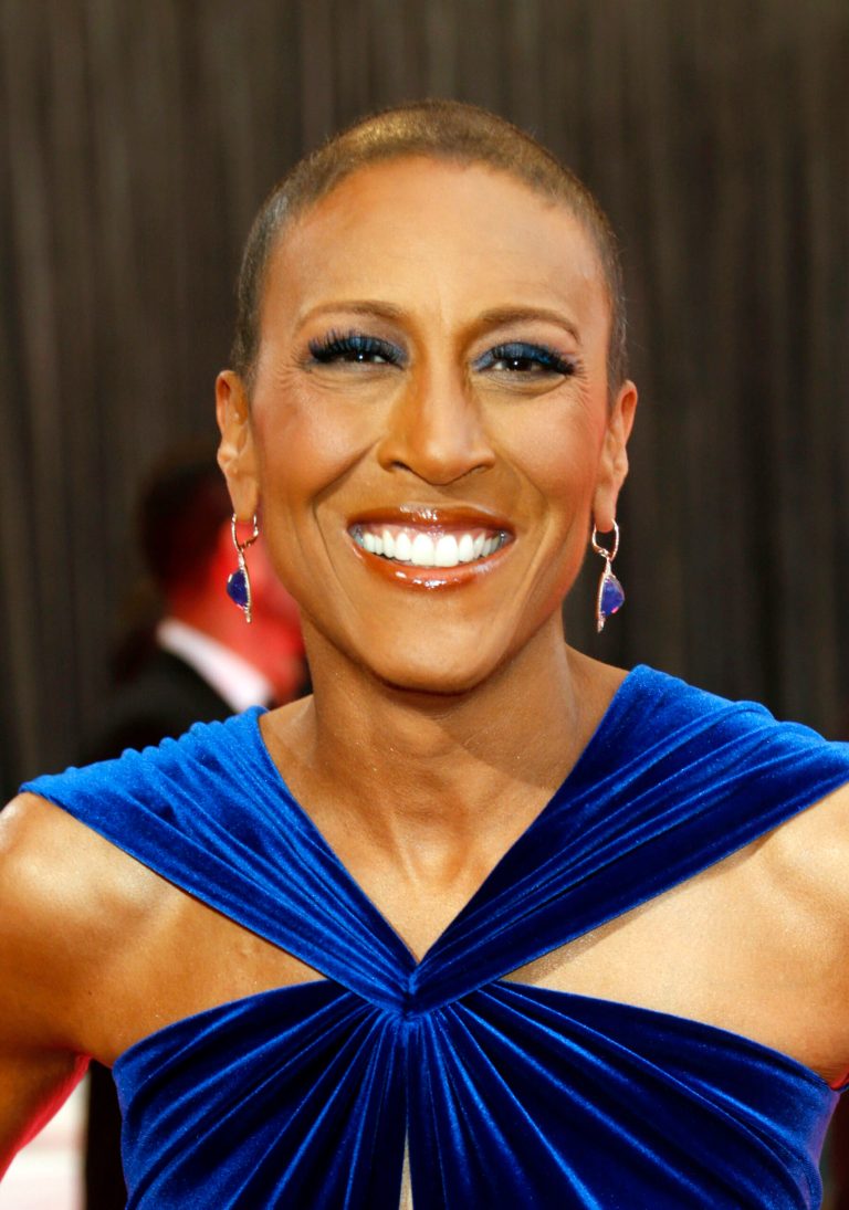 File-This Feb. 24, 2013 file photo shows broadcaster Robin Roberts arriving at the 85th Academy Awards at the Dolby Theatre in Los Angeles. Roberts thanked her longtime girlfriend, Amber Laign, in a year-end post published on the ABC News anchorÃ?s Facebook page on Sunday, Dec. 29, 2013. The message comes after RobertsÃ? battle with a life-threatening illness. This is the first time the Ã?Good Morning AmericaÃ? anchor has publicly acknowledged her 10-year, same-sex relationship with Laign, a massage therapist from the San Francisco Bay Area, who focuses on patients recovering from injuries. (Photo by Todd Williamson/Invision/AP, File)