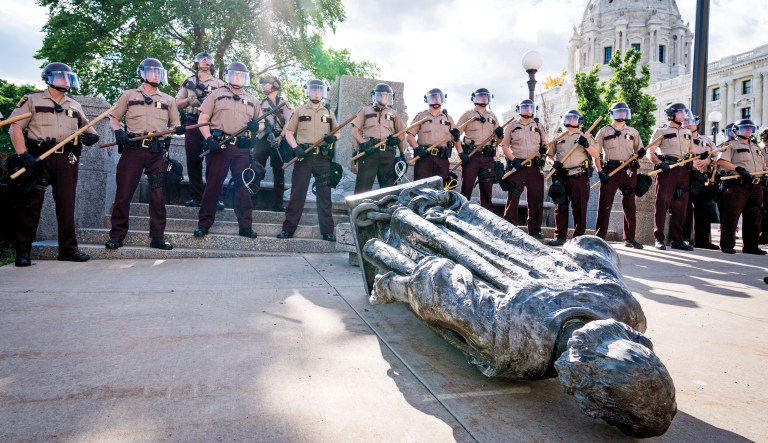Red paint covers a statue of Christopher Columbus on Monday, Oct. 14, 2019, in Providence, R.I., after it was vandalized on the day named to honor him as one of the first Europeans to reach the New World.