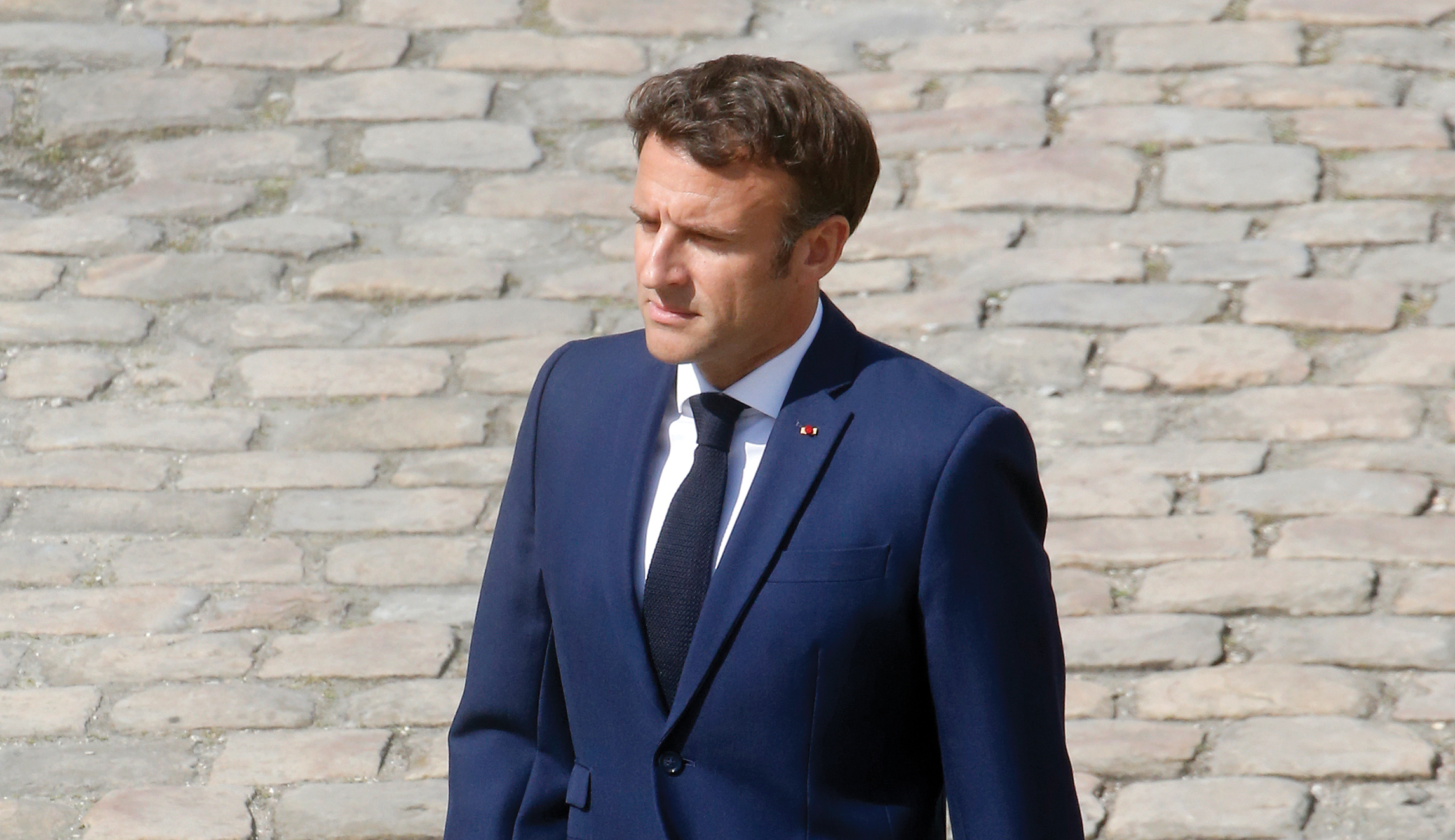 Macron alone