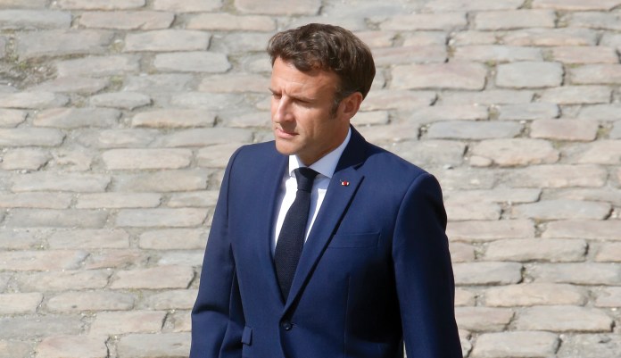 Macron alone