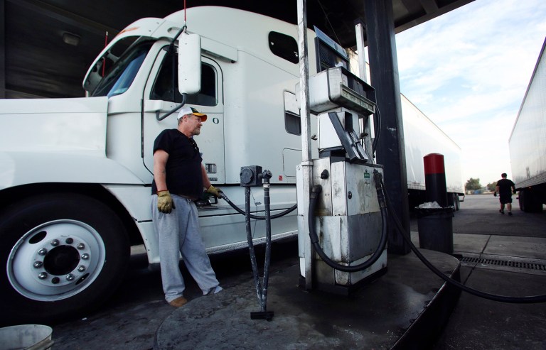 The second round of standards require up to 25 percent lower carbon emissions and fuel consumption from tractors used in tractor-trailer vehicles, delivery trucks, school buses and other vocational vehicles by 2027, compared to the first round of standards that expire in 2018. (AP Photo/Gary Kazanjian)