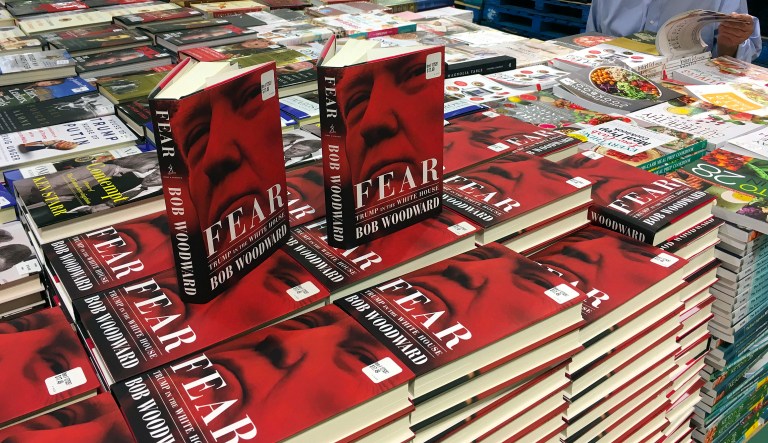 Copies of Bob Woodward's "Fear" are seen for sale at Costco, Wednesday, Sept. 11, 2018 in Arlington, Va. It's not clear whether President Donald Trump has much to fear from "Fear" itself. But the book of that name has set off a yes-no war between author Bob Woodward and the president, using all the assets they can muster.