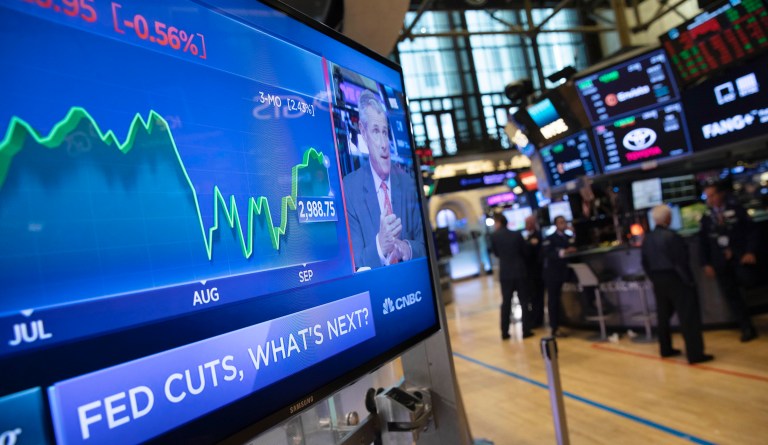 A television monitor at the New York Stock Exchange carries the news after the Federal Reserve made its interest rate announcement, Wednesday, Sept. 18, 2019. 
