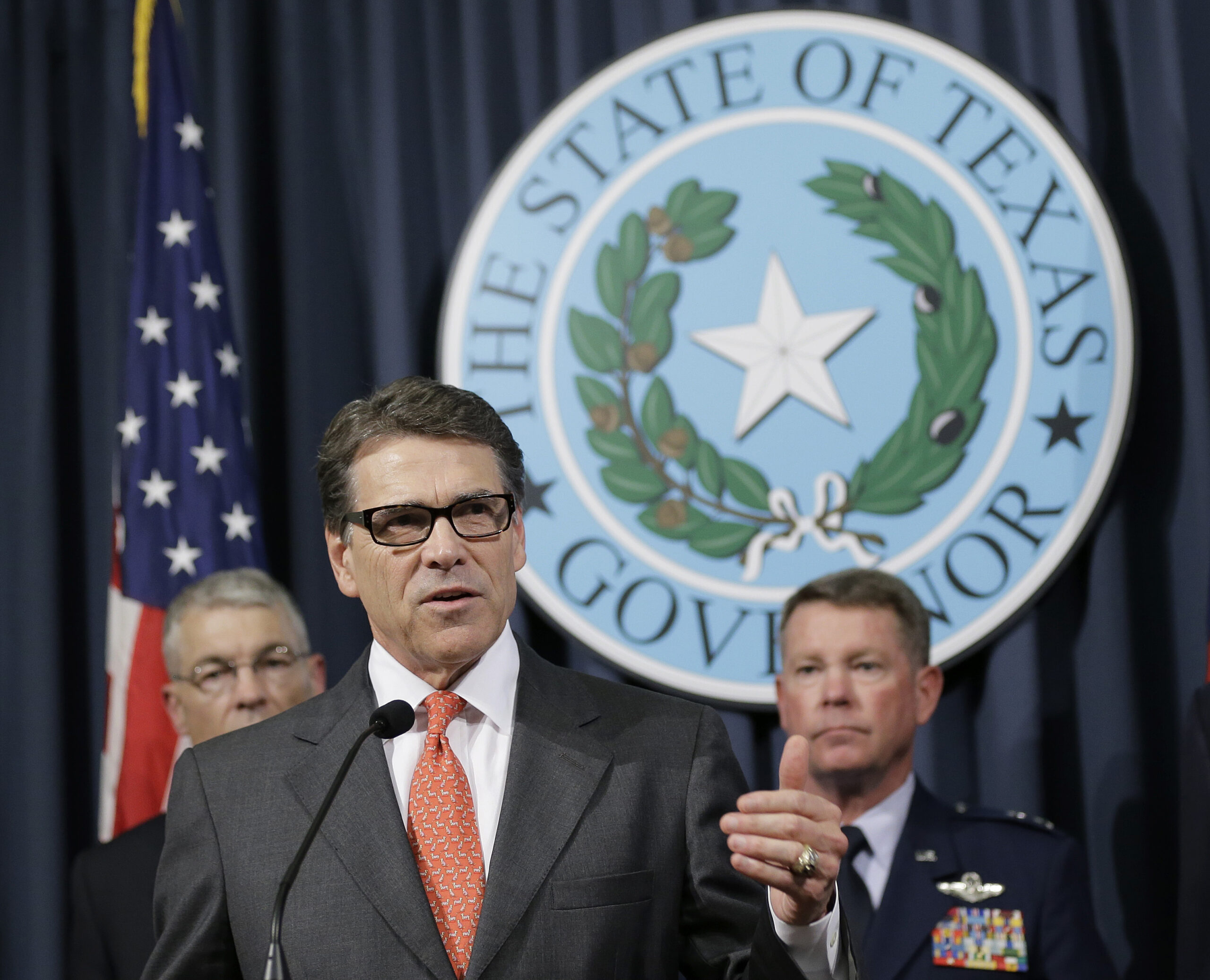On immigration, Texas Gov. Rick Perry leads while Obama raises funds