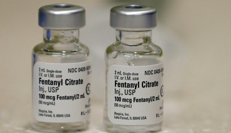 FILE- In this June 1, 2018 file photo, small vials of fentanyl are shown in the inpatient pharmacy at the University of Utah Hospital in Salt Lake City. Nebraska state officials are preparing for their first execution in two decades on Aug. 14 at the Nebraska State Penitentiary in Lincoln, Neb., and their first-ever lethal injection with an untried combination of drugs. The new execution protocol calls for an initial IV dose of diazepam, commonly known as Valium, to render the inmate unconscious; the powerful synthetic opioid fentanyl; cisatracurium besylate to induce paralysis and stop the inmate from breathing; and potassium chloride to stop the heart.