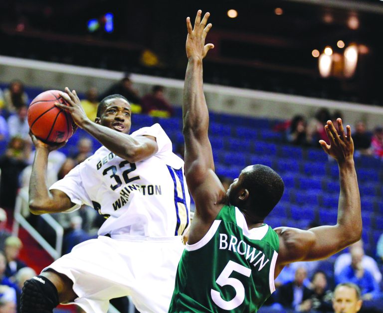 Luis M. Alvarez/AP
Isaiah Armwood finished with 23 points, nine rebounds and six blocks in George Washington's win over Manhattan.