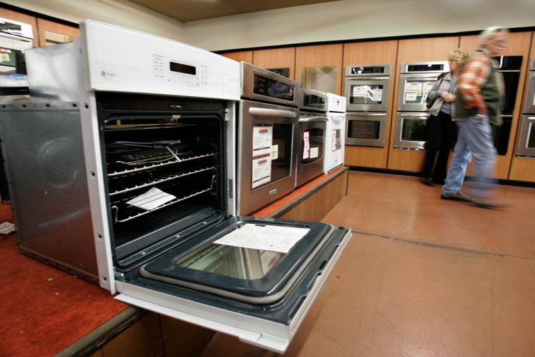 General Electric offered to sell its major appliances division to Electrolux for $3.3 billion, but the Justice Department asked a court to stop the transaction over the summer. (AP Photo)