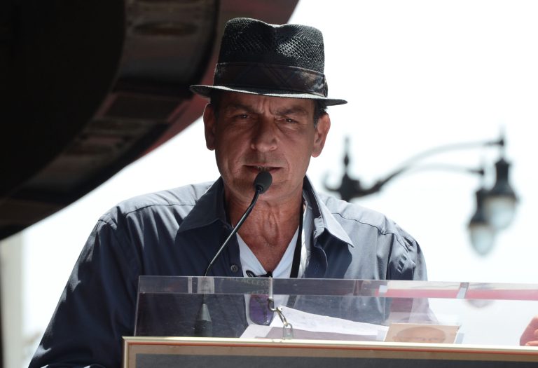 HOLLYWOOD, CA - JULY 10:  Actor Charlie Sheen speaks at the 2,473rd star on the Hollywood Walk of Fame for musician Slash outside the Hard Rock Cafe on July 10, 2012 in Hollywood, California.  (Photo by Frazer Harrison/Getty Images)
