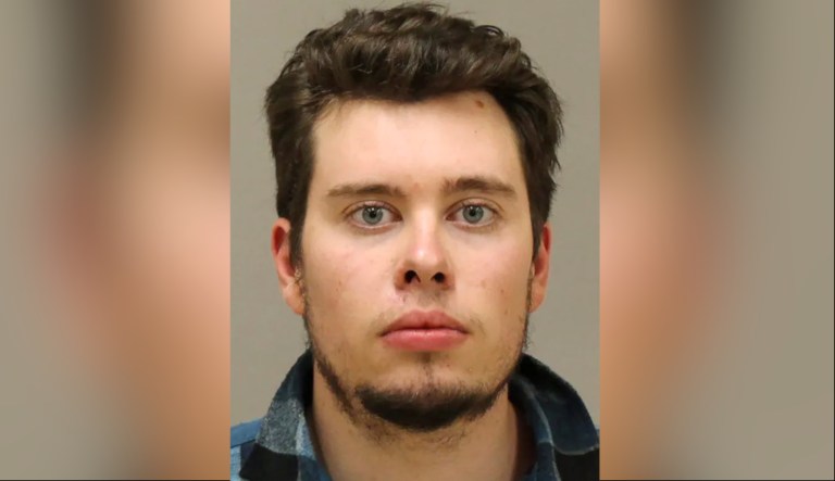 FILE - In a photo provided by the Kent County Sheriff, Ty Garbin is shown in a booking photo. Garbin, one of six men charged in an alleged plot to snatch Michigan Gov. Gretchen Whitmer has agreed to plead guilty to a kidnapping conspiracy, according to court document filed Wednesday, Jan. 27, 2021. The filing was made by prosecutors ahead of Ty Garbin's appearance in federal court in Grand Rapids. 