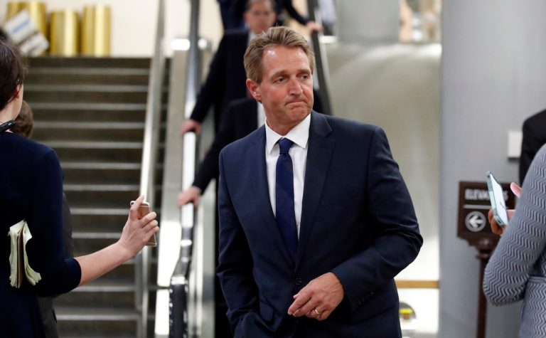 Sen. Jeff Flake, R-Ariz., turns after speaking with a reporter after a vote on Gina Haspel to be CIA director, on Capitol Hill, Thursday, May 17, 2018 in Washington.