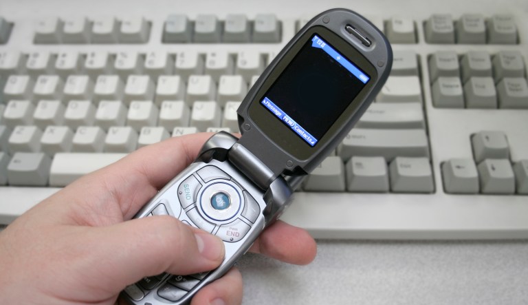 making a cell phone call at the office.Other cell phone related images.