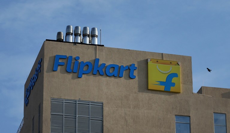 A bird flies over the Flipkart headquarters in Bangalore, India, Wednesday, May 9, 2018. Walmart is paying $16 billion for a controlling stake in India's giant online retailer Flipkart, breaking into a fast-growing economy where it has struggled to establish a foothold.