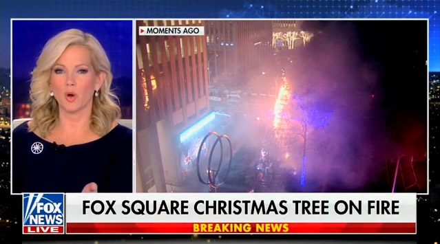 Christmas tree outside Fox headquarters engulfed in flames