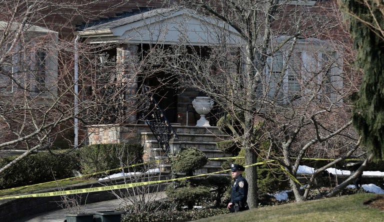 Police work near the scene where an alleged leader of the Gambino crime family was shot and killed in the Staten Island borough of New York, Thursday, March 14, 2019. 