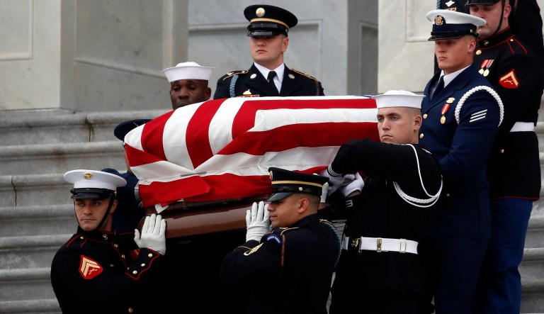 Former President George H.W. Bush's casket is removed from the U.S. Capitol in Washington, D.C.