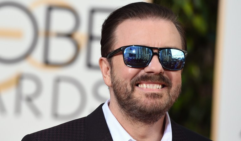 Ricky Gervais, host of this Sunday's 77th Annual Golden Globe Awards, banters with members of the media during Preview Day for the Globes at the Beverly Hilton, Friday, Jan. 3, 2020, in Beverly Hills, Calif.