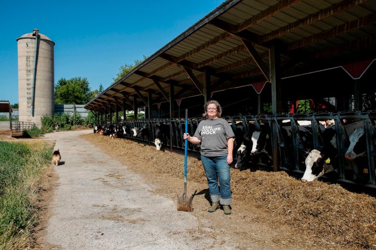 Sarah Lloyd, a member of the Farmers Union and vice president of the local chapter, poses on her farm in Wisconsin Dells, Wisconsin, on August 16.