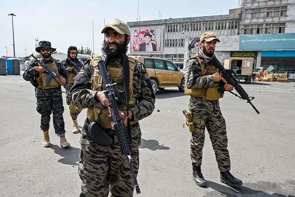 Members of the Taliban Badri 313 military unit arrive at the airport in Kabul on August 31, 2021.