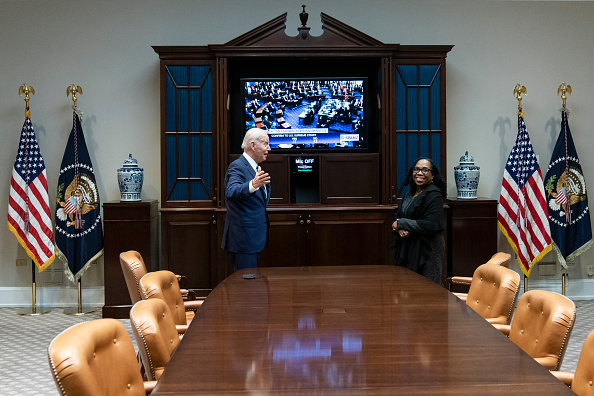 Ketanji Brown Jackson (right) was confirmed to the Supreme Court on Thursday, making history as the first black woman to join its ranks while leaving the ideological balance in America's highest court unchanged.