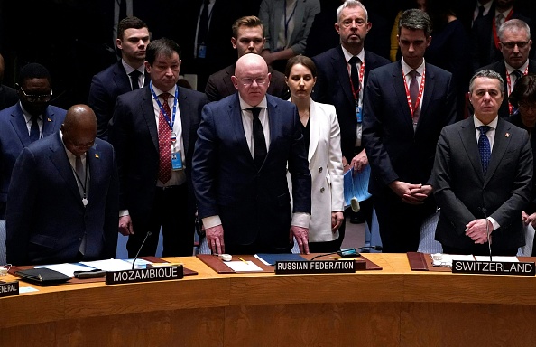 Russia's U.N. Ambassador Vassily Nebenzia stands for a moment of silence during the United Nations Security Council meeting on the maintenance of peace and security of Ukraine.
