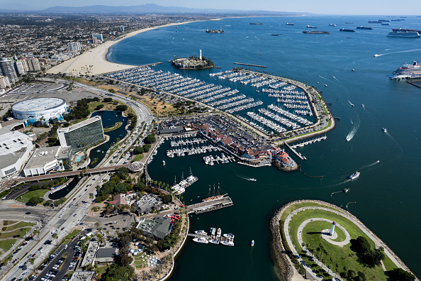 Aerial view of container ships waiting to enter and unload at Port of Long Beach on October 16, 2021 in Long Beach, California. 