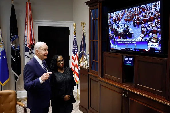 President Joe Biden and Judge Ketanji Brown Jackson watch together as the Senate votes to confirm her to be the first black woman to be a justice on the Supreme Court in the Roosevelt Room at the White House on Thursday.