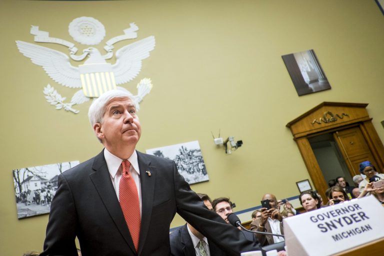 Former Michigan governor charged with neglect of duty in Flint water crisis