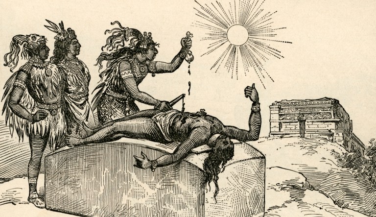 Vintage illustration of an Aztec priest removing the heart of a victim as a sacrifice to the gods; engraving, 1889.