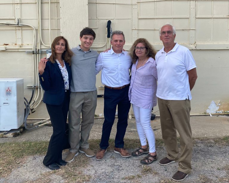 In this photo, reviewed by a U.S. Dept of Defense official, a turret-gunner rides in a Humvee on patrol which passes by the compound at Camp Delta, Guantanamo Bay U.S. Naval Base, Cuba, Thursday, Dec. 7, 2006.