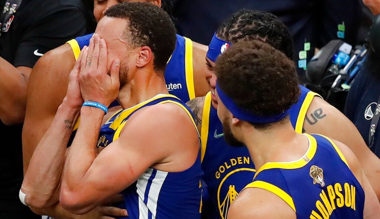 Golden State Warriors guard Stephen Curry reacts after the Warriors defeated the Boston Celtics in Game 6 of basketball's NBA Finals, Thursday, June 16, 2022, in Boston.