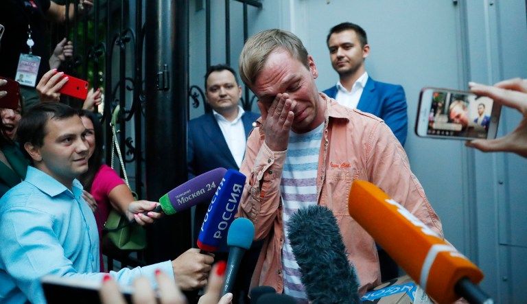 Prominent Russian investigative journalist Ivan Golunov, cries as he leaves a Investigative Committee building in Moscow, Russia, Tuesday, June 11, 2019.