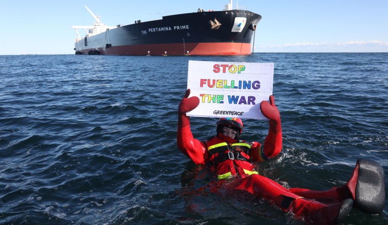 Activists use rib boats and kayaks to stop supertanker oil transfer in Denmark
