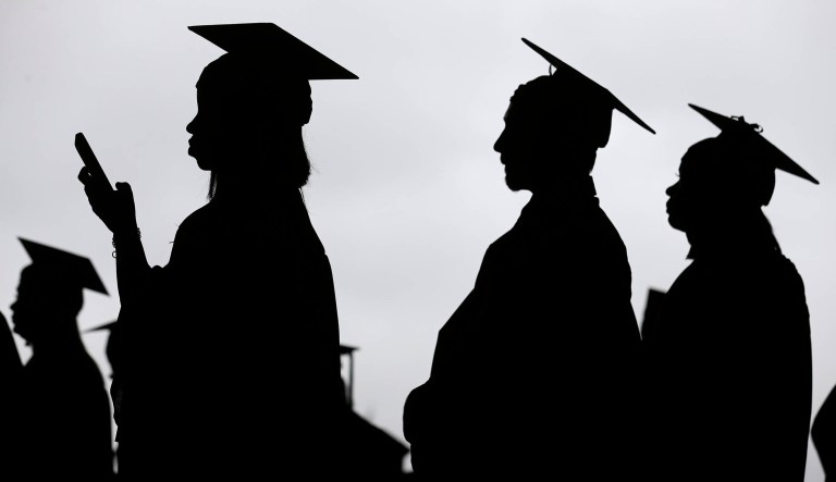 New graduates line up before the start of the Bergen Community College commencement at MetLife Stadium in East Rutherford, N.J., Thursday, May 17, 2018.