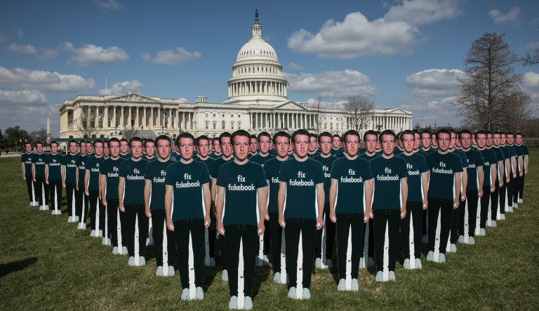 Cutouts of Facebook CEO Mark Zuckerberg appear on the east lawn of the Capitol ahead of his testimony before a joint hearing of the Senate Judiciary and Commerce Committees, Tuesday, April 10, 2018.