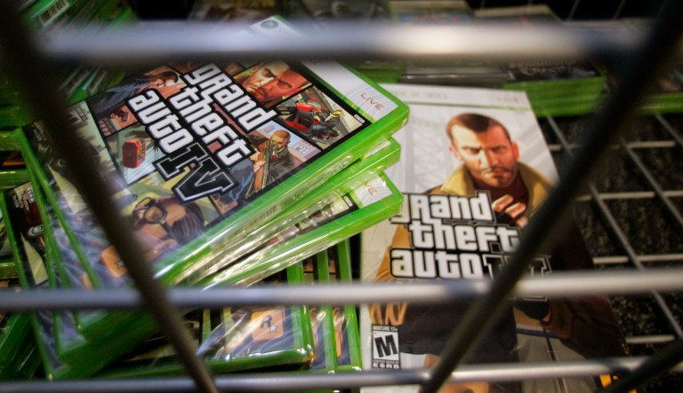Copies of the computer action game "Grand Theft Auto IV" are stored in a locked cabinet the first day it goes on sale at a Best Buy store in West Hollywood, Calif., Tuesday, April 29, 2008.