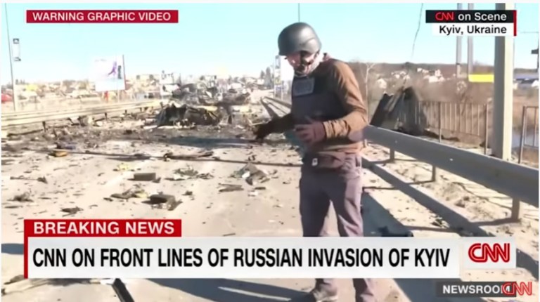 WATCH: CNN reporter realizes he’s crouching near grenade after battle in Kyiv