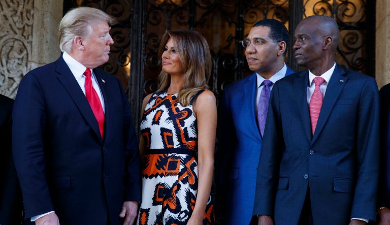 President Trump and first lady Melania Trump pose for media with Caribbean leaders at Mar-A Lago, Friday, March 22, 2019, in Palm Beach, Fla. From left are President Trump, Melania Trump, Jamaica's Prime Minister Andrew Holness, and Haiti President Jovenel Moise. 