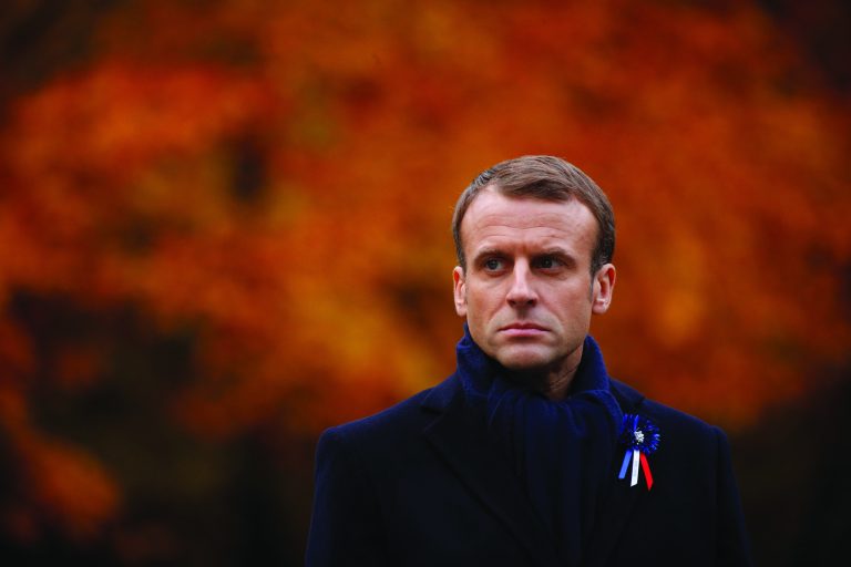 French President Emmanuel Macron attends a ceremony with German Chancellor Angela Merkel in the Clairiere of Rethondes, as part of a commemoration ceremony for Armistice Day, 100 years after the end of the First World War, in Compiegne, North of Paris, France, Saturday, Nov. 10, 2018. (Philippe Wojazer/Pool Photo via AP)