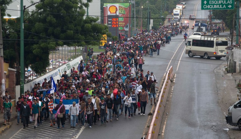 Honduran migrants walking to the U.S. start their day departing Chiquimula, Guatemala, Wednesday, Oct. 17, 2018. The group of some 2,000 Honduran migrants hit the road in Guatemala again Wednesday, hoping to reach the United States despite President Donald Trump's threat to cut off aid to Central American countries that don't stop them.