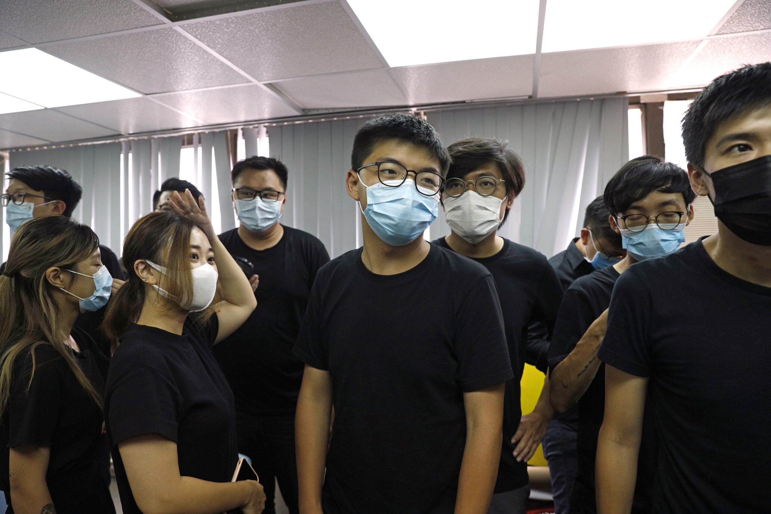 Joshua Wong and 11 other activists banned from Hong Kong elections