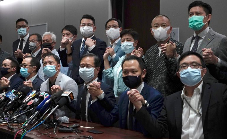Hong Kong pro-democracy legislators resign en masse after colleagues ousted